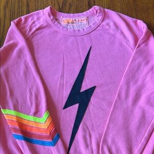 Aviator Nation Pink Sweatshirt with Black Lightning and Rainbow Sleeve Stripes